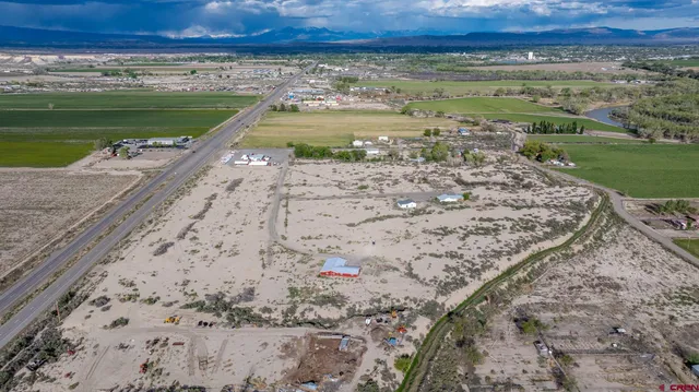 a view of a water fountain and a yard