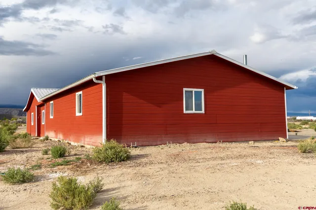 a front view of house with yard