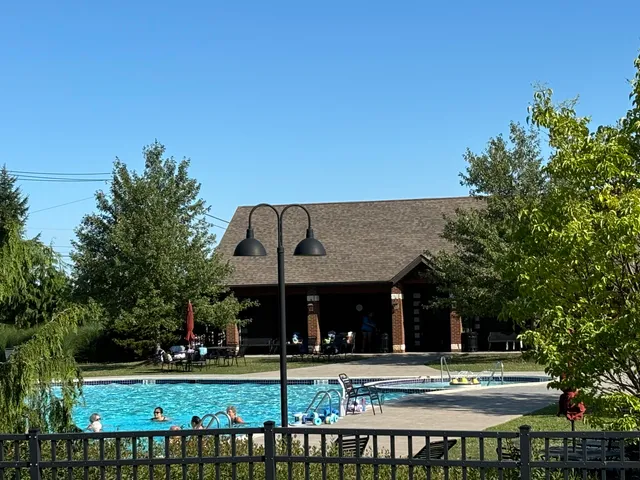 a view of a lake with a yard