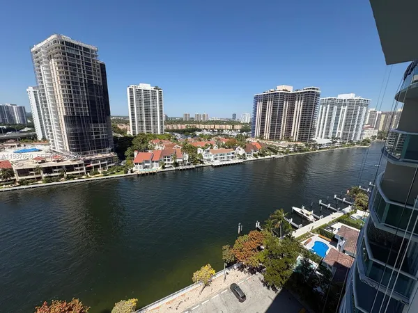 a view of a balcony with chairs