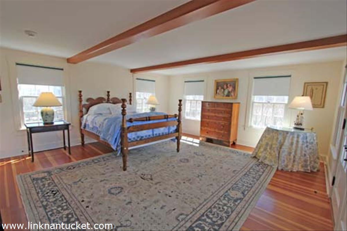 68 Baxter Road Nantucket, MA 02554 - Photo 10 of 22 1st Floor Bedroom with private bath & doors to the patio