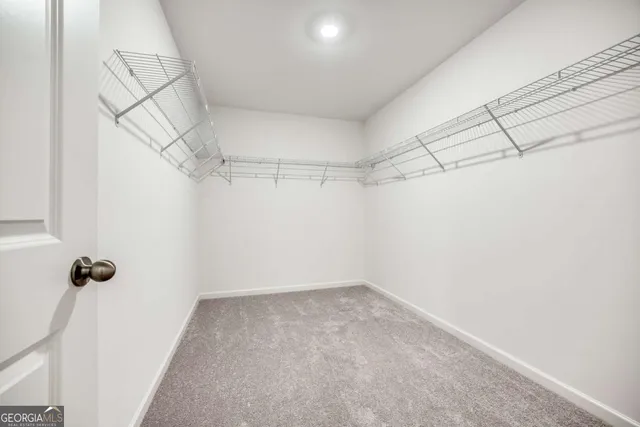 a view of a room with racks on the wall