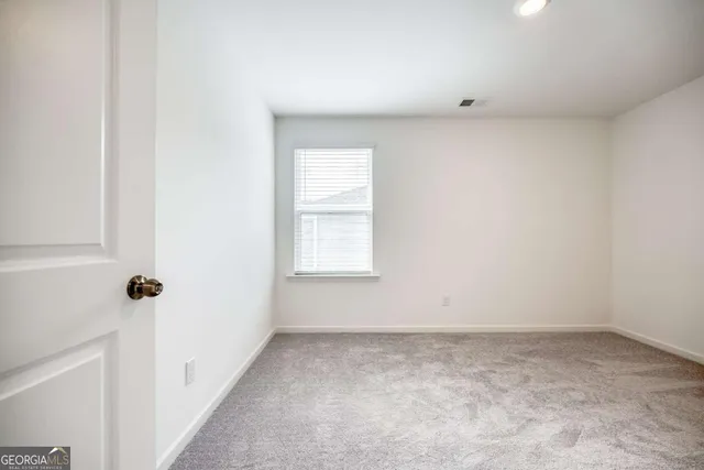 a view of a room with a window