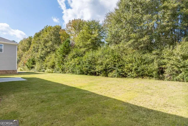 a view of an outdoor space and a yard