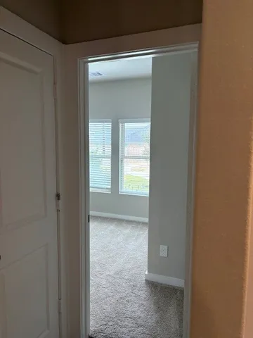 a bathroom with a toilet a sink and bathtub