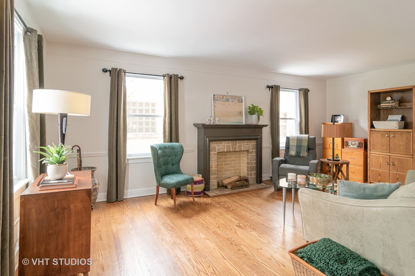 539 Selborne Road Riverside, IL 60546 - Photo 2 of 17 a living room with furniture and a fireplace