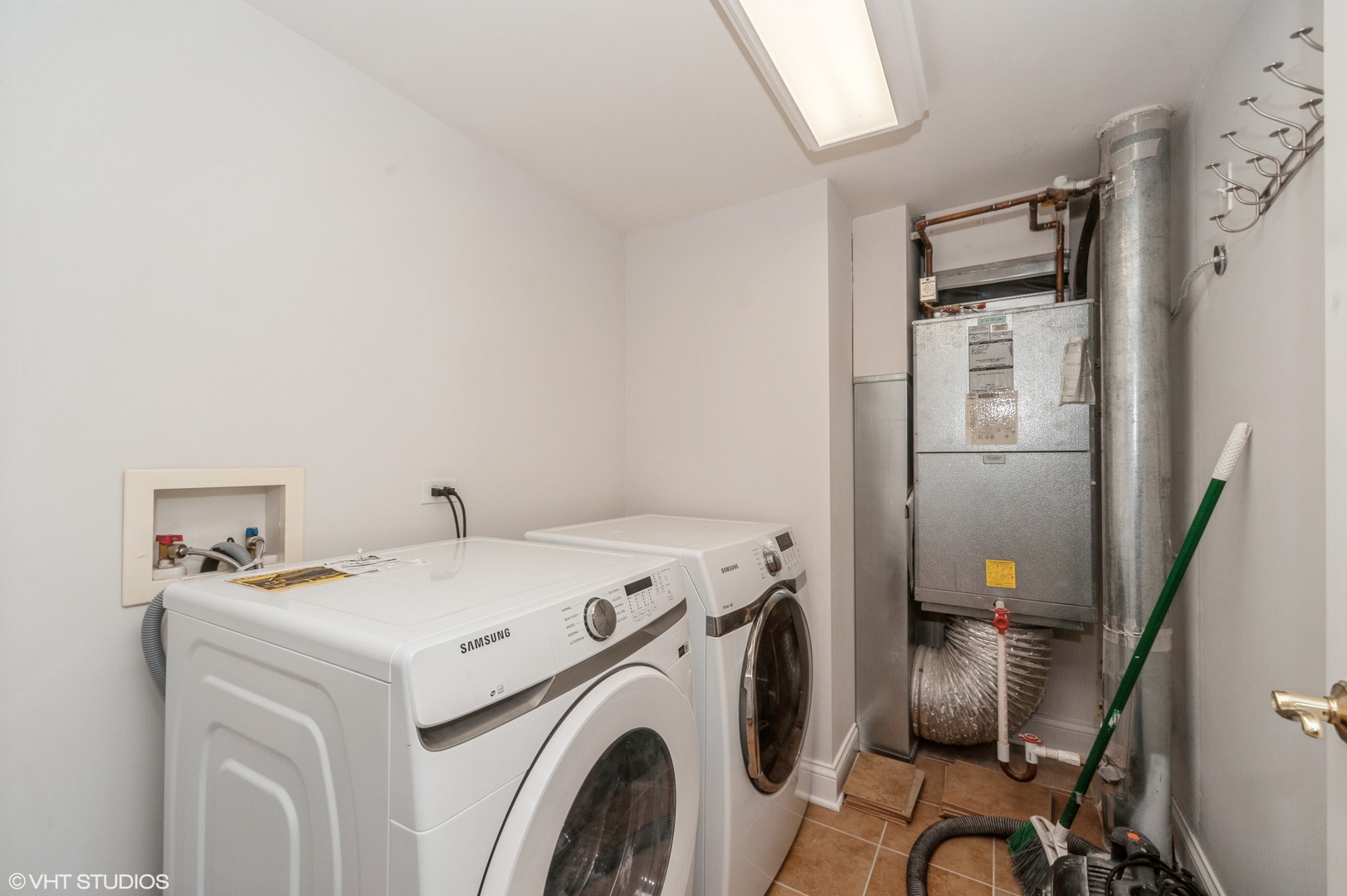 115 Prairie Park Drive, Unit 407 Wheeling, IL 60090 - Photo 13 of 17 a utility room with dryer and washer
