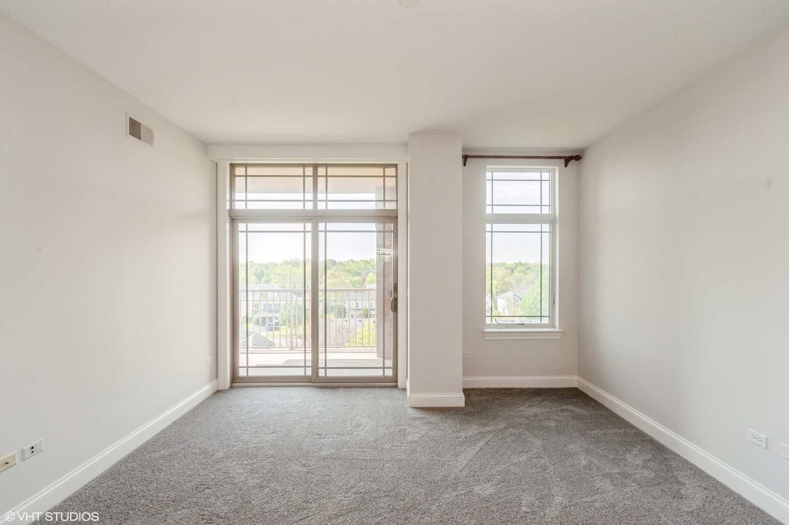 115 Prairie Park Drive, Unit 407 Wheeling, IL 60090 - Photo 10 of 17 an empty room with windows