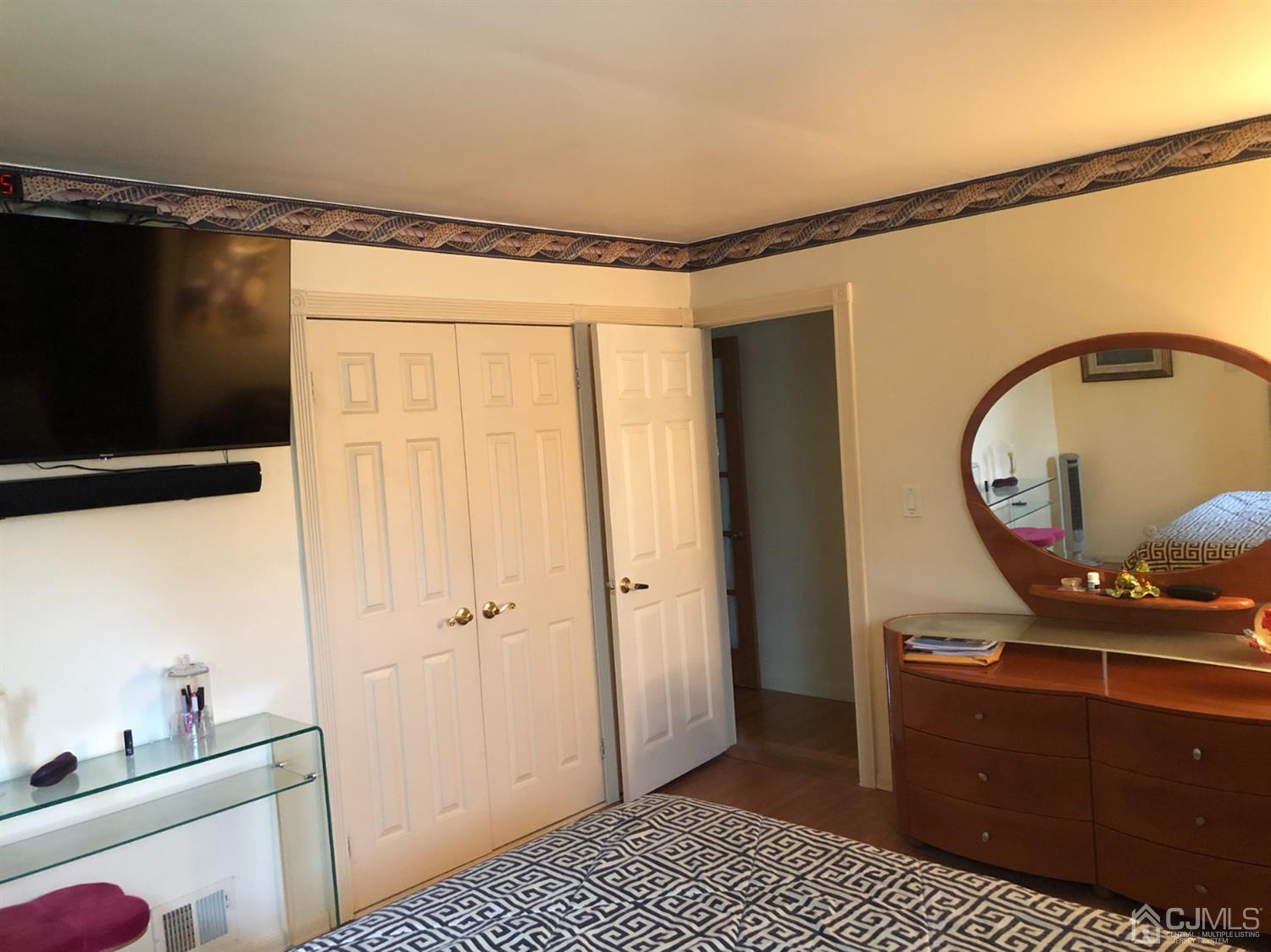 4 Brandeis Road Old Bridge, NJ 08859 - Photo 12 of 24 a bedroom with a bed and a dresser