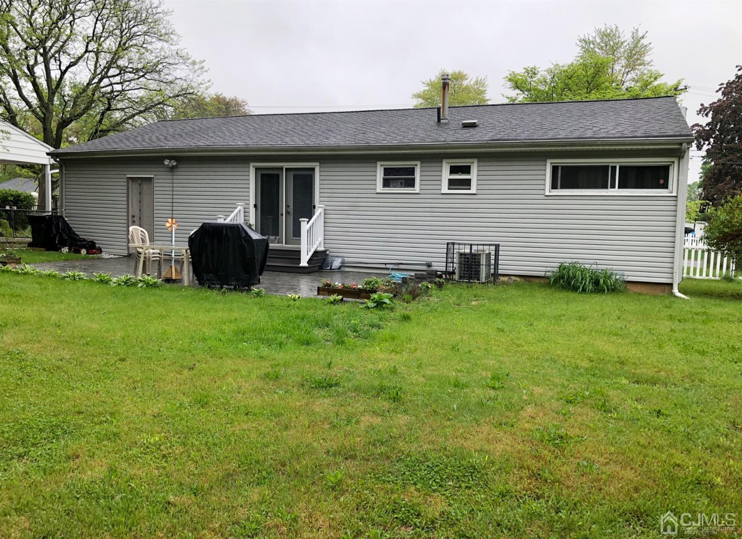4 Brandeis Road Old Bridge, NJ 08859 - Photo 22 of 24 a front view of house with yard and deck