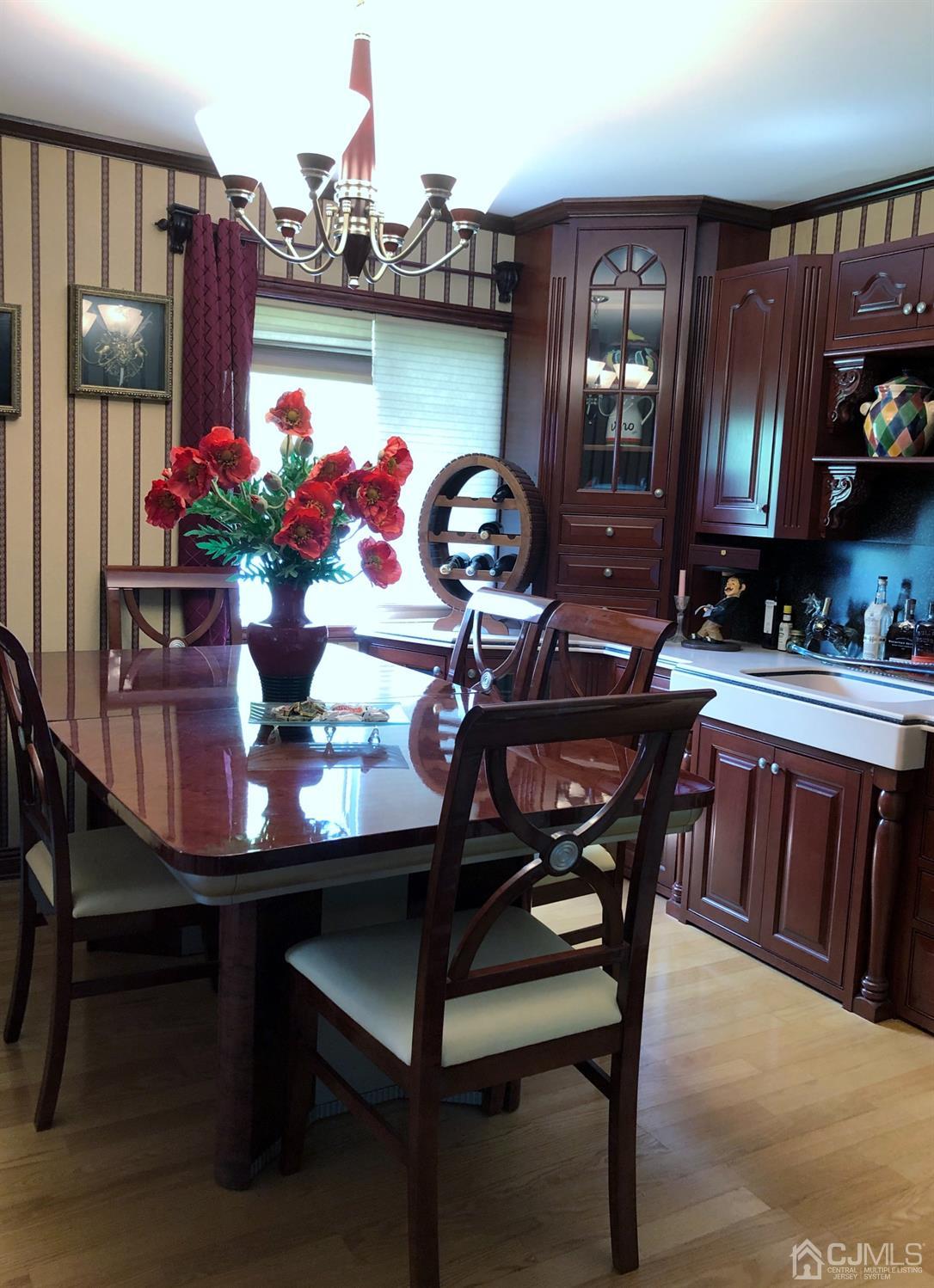 4 Brandeis Road Old Bridge, NJ 08859 - Photo 5 of 24 a view of a dining room with furniture and chandelier