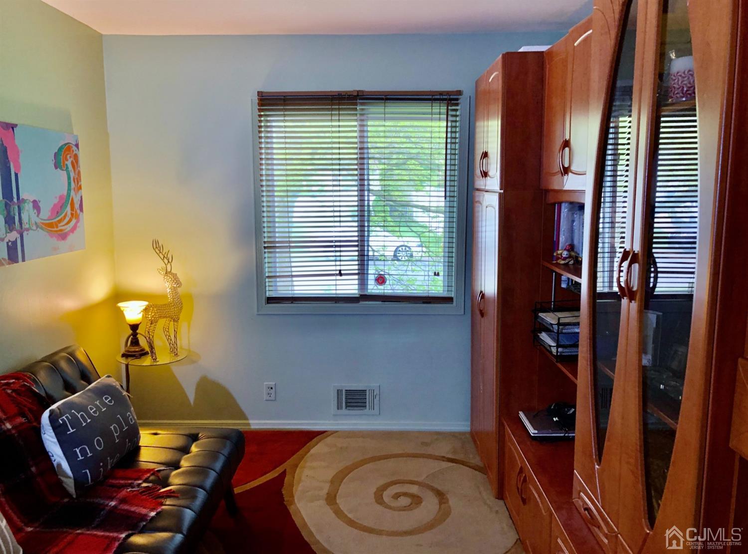 4 Brandeis Road Old Bridge, NJ 08859 - Photo 10 of 24 a living room with furniture and a window