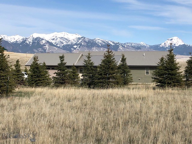 259 Shining Mountains Loop Road Ennis, MT 59729 - Photo 1 of 1 View of the Home looking from the East to the Madison Range in the West. This is the unobstructed view as you are entering the driveway.
