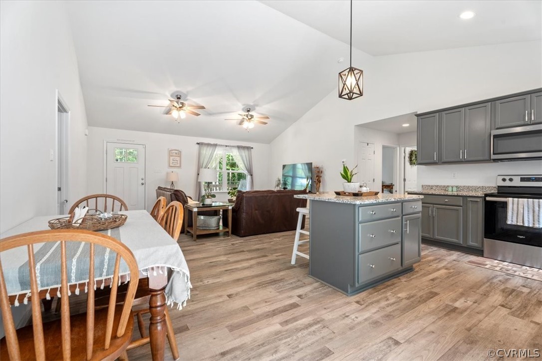 1820 Ballsville Road Powhatan, VA 23139 - Photo 12 of 46 a living room with furniture kitchen view and a wooden floor