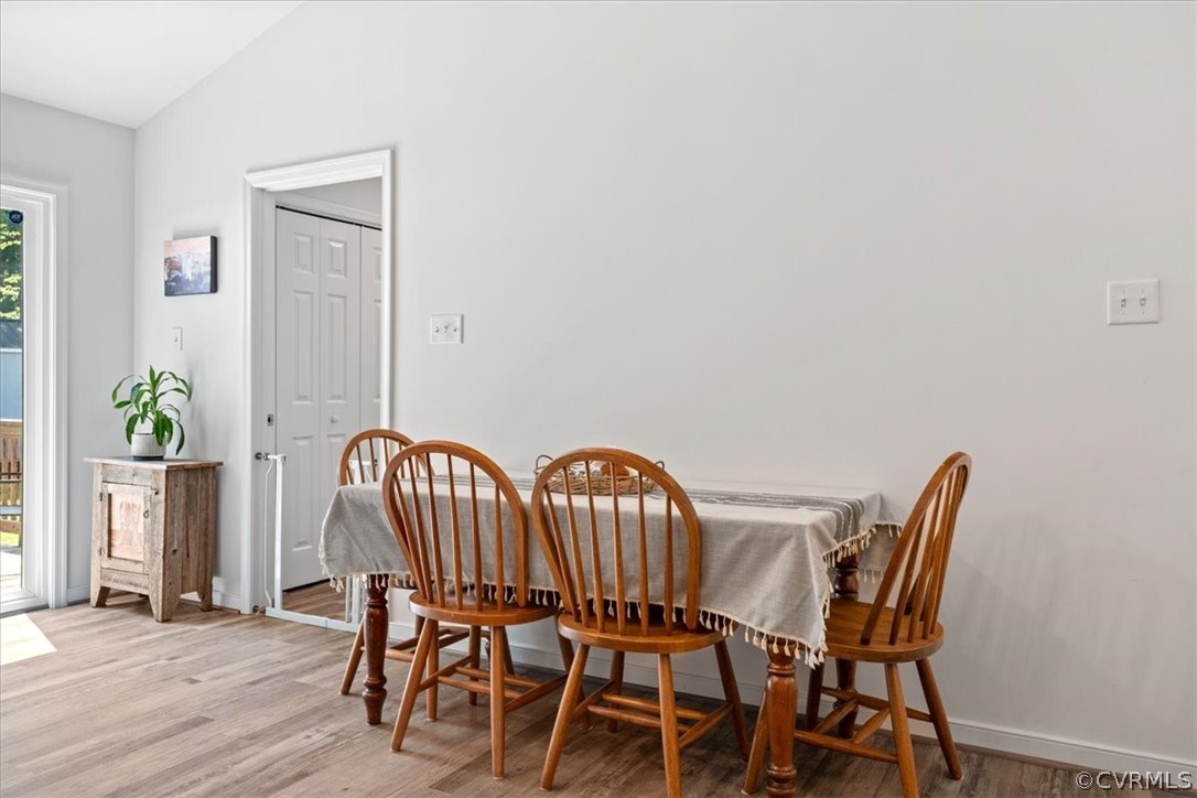 1820 Ballsville Road Powhatan, VA 23139 - Photo 13 of 46 a view of a dining room with furniture and wooden floor