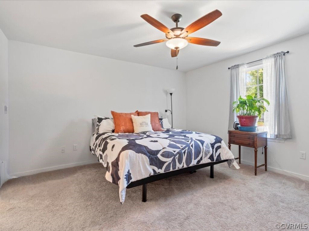 1820 Ballsville Road Powhatan, VA 23139 - Photo 17 of 46 a bedroom with bed and a window
