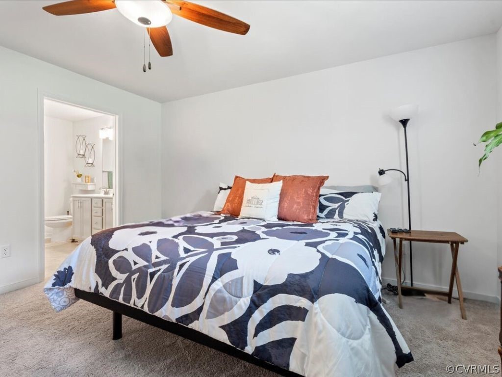 1820 Ballsville Road Powhatan, VA 23139 - Photo 18 of 46 a bed sitting in a bedroom next to a window