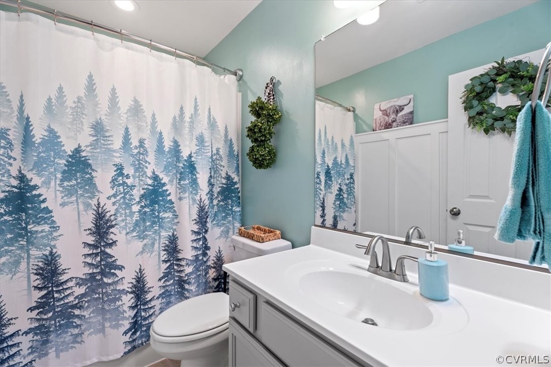 1820 Ballsville Road Powhatan, VA 23139 - Photo 24 of 46 a bathroom with a sink toilet and shower