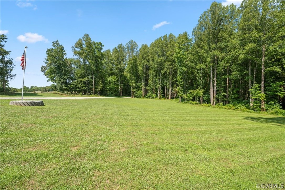 1820 Ballsville Road Powhatan, VA 23139 - Photo 35 of 46 a view of a green field with trees in the background