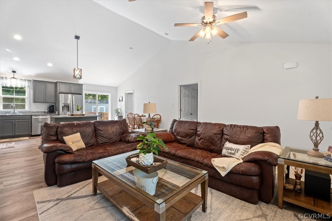 1820 Ballsville Road Powhatan, VA 23139 - Photo 7 of 46 a living room with furniture ceiling fan and a rug