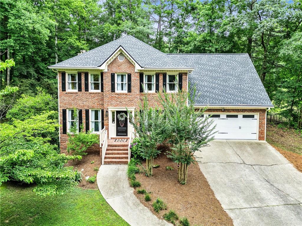 135 Crimson Ridge Tyrone, GA 30290 - Photo 2 of 53 a aerial view of a house with a yard
