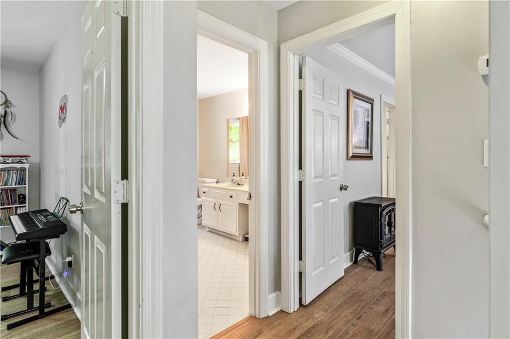 135 Crimson Ridge Tyrone, GA 30290 - Photo 30 of 53 a view of a bathroom from a hallway