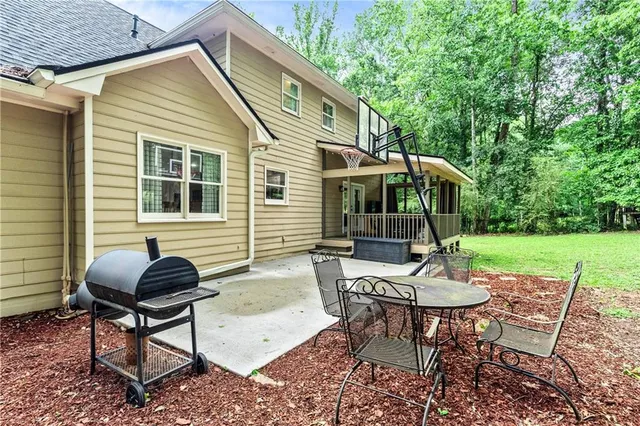 a view of backyard with green space
