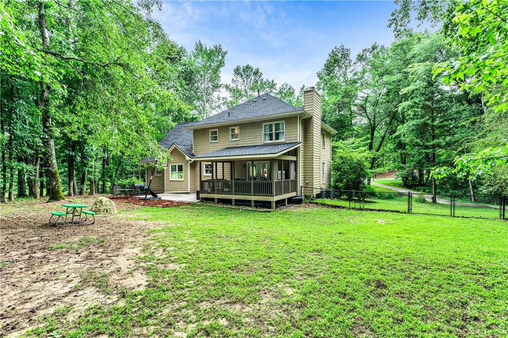 135 Crimson Ridge Tyrone, GA 30290 - Photo 48 of 53 a view of a house with backyard