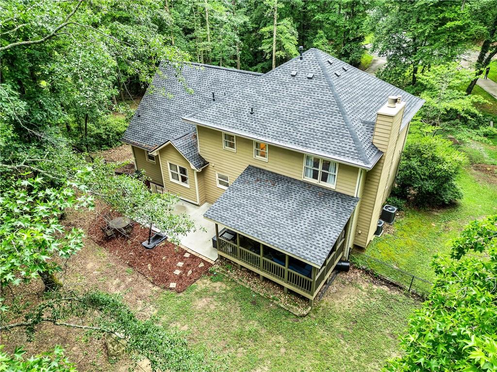 135 Crimson Ridge Tyrone, GA 30290 - Photo 49 of 53 an aerial view of a house with a yard table and chairs