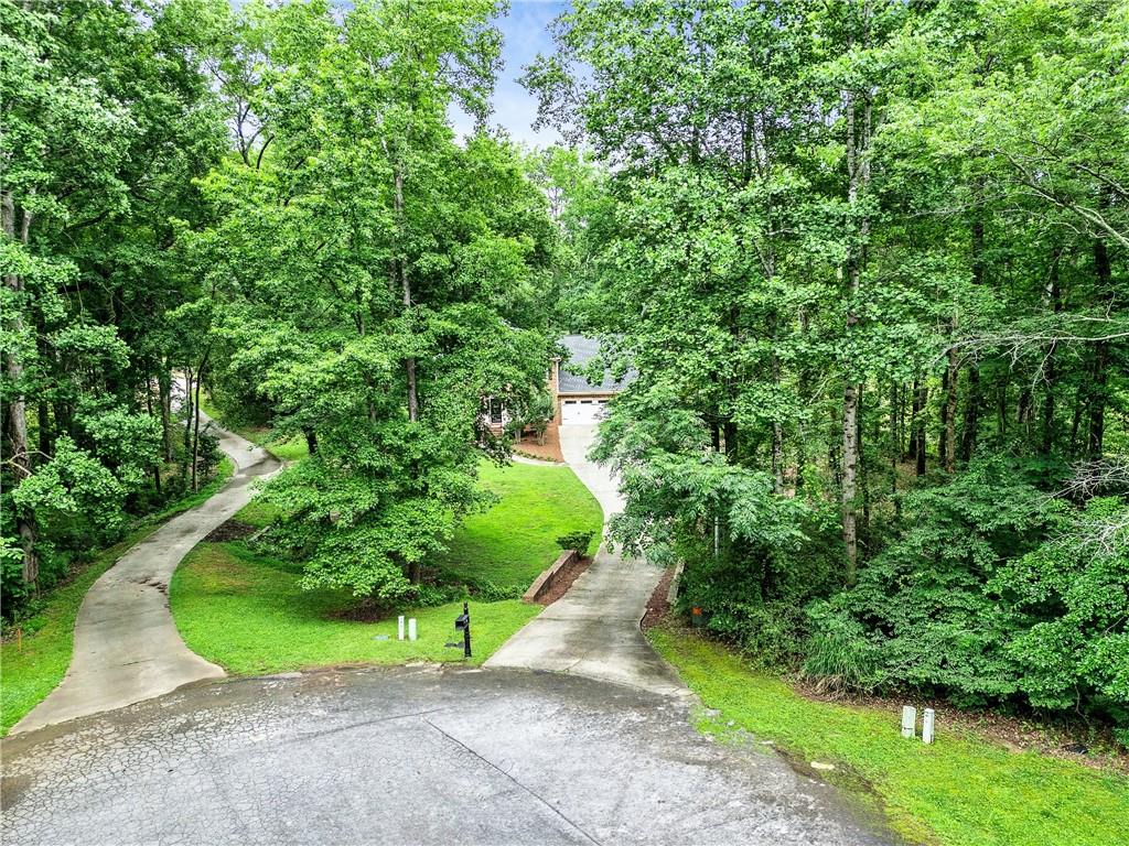135 Crimson Ridge Tyrone, GA 30290 - Photo 50 of 53 a view of a garden with a tree