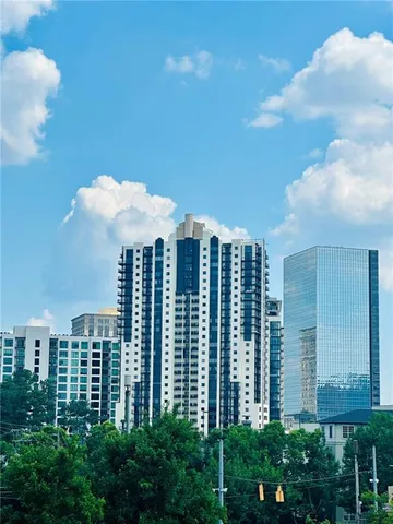 a view of a city with tall buildings