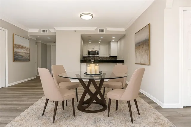 a view of a dining room with furniture
