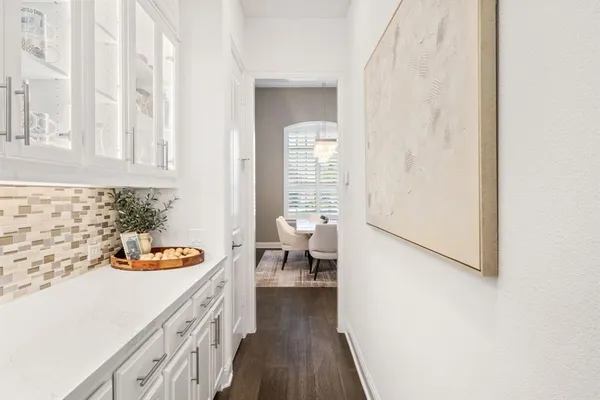 a bathroom with a sink and a window