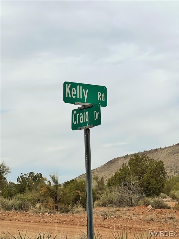 2280 Kelly Road Kingman, AZ 86401 - Photo 3 of 33 a close up of a street sign