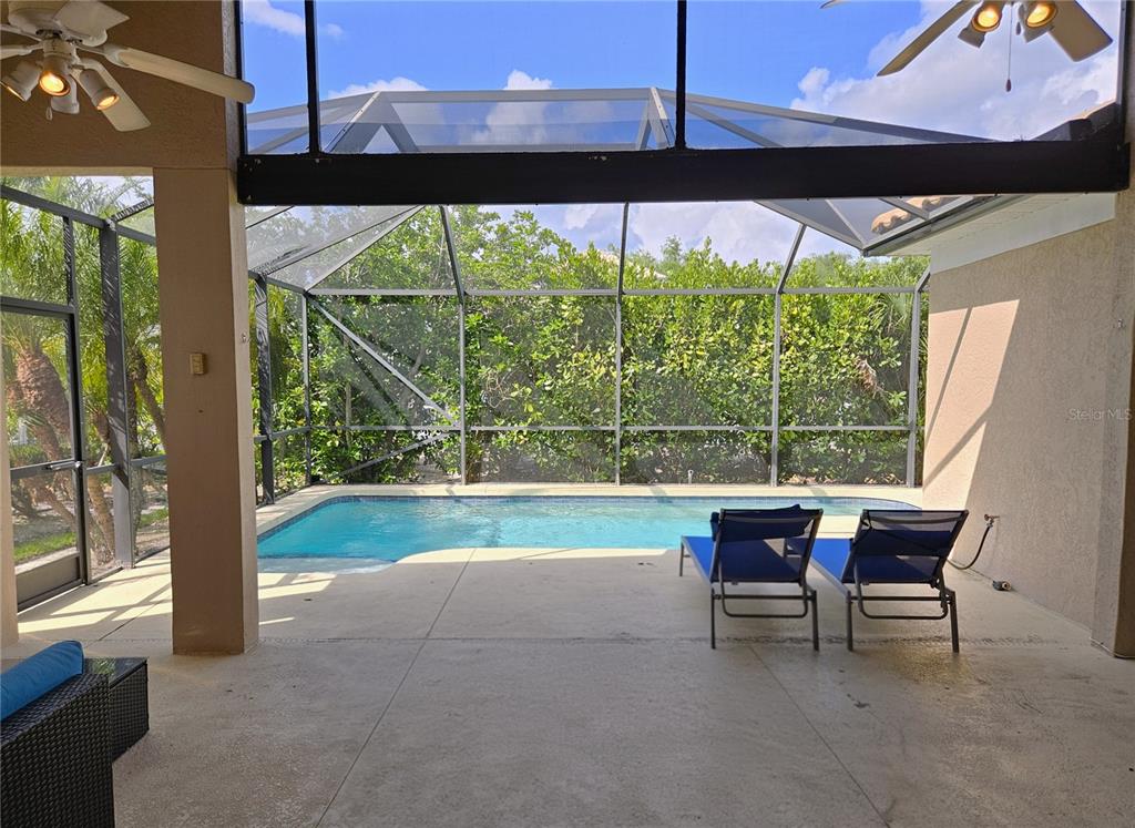 175 Braemar Avenue Venice, FL 34293 - Photo 14 of 40 a view of a porch with furniture and yard