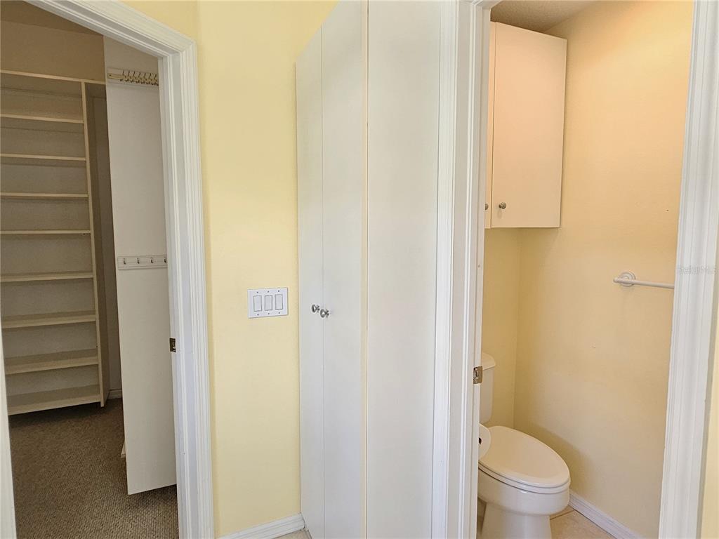 175 Braemar Avenue Venice, FL 34293 - Photo 25 of 40 a bathroom with a granite countertop toilet and a sink