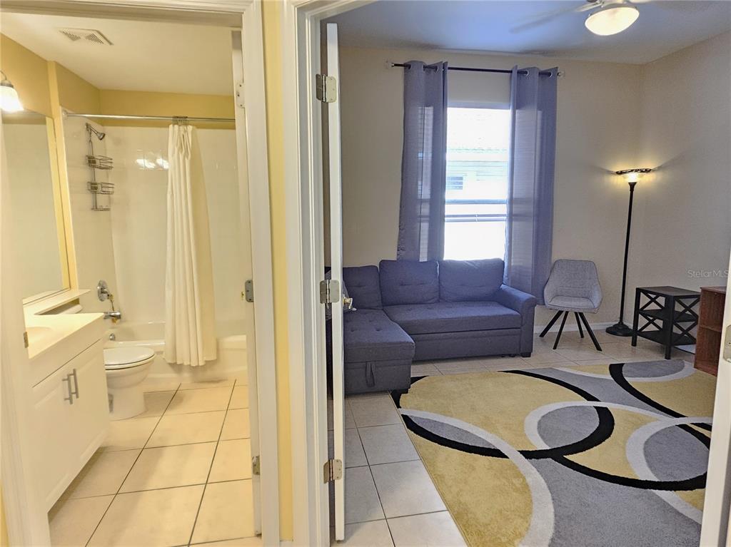 175 Braemar Avenue Venice, FL 34293 - Photo 27 of 40 a living room with furniture and a window