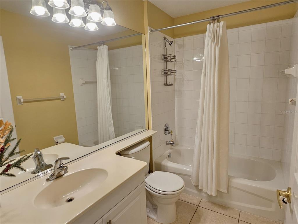 175 Braemar Avenue Venice, FL 34293 - Photo 30 of 40 a bathroom with a sink toilet and shower