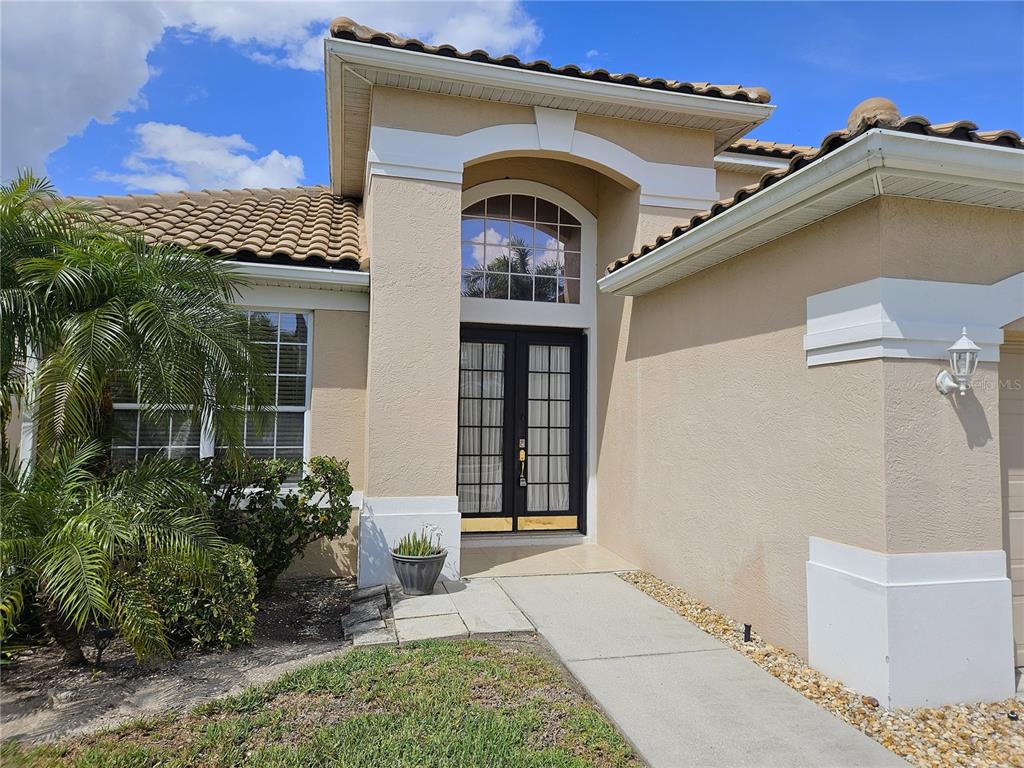 175 Braemar Avenue Venice, FL 34293 - Photo 3 of 40 a front view of a house