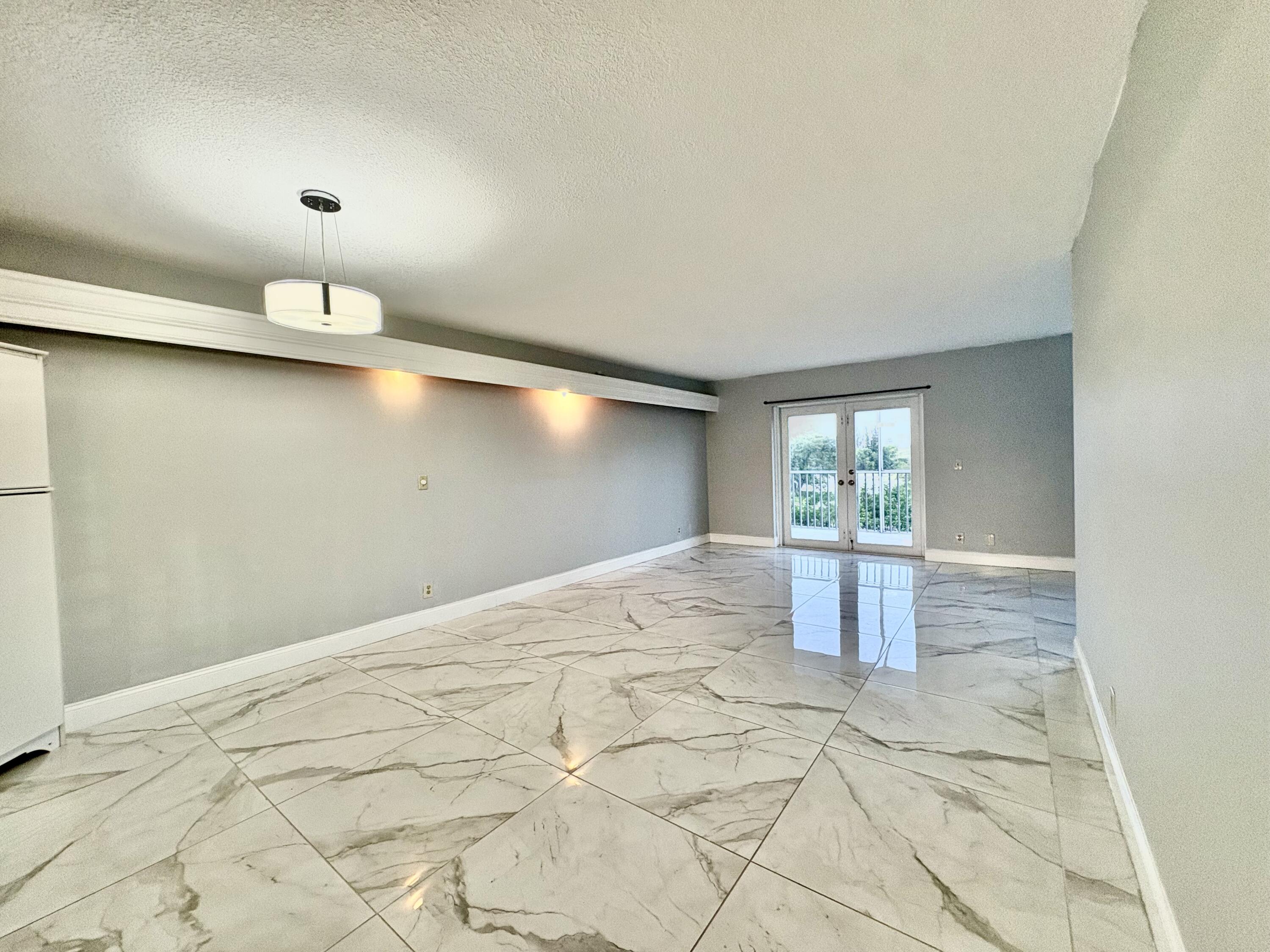 5700 Northwest 2nd Avenue, Unit 311 Boca Raton, FL 33487 - Photo 8 of 33 LIVING ROOM
