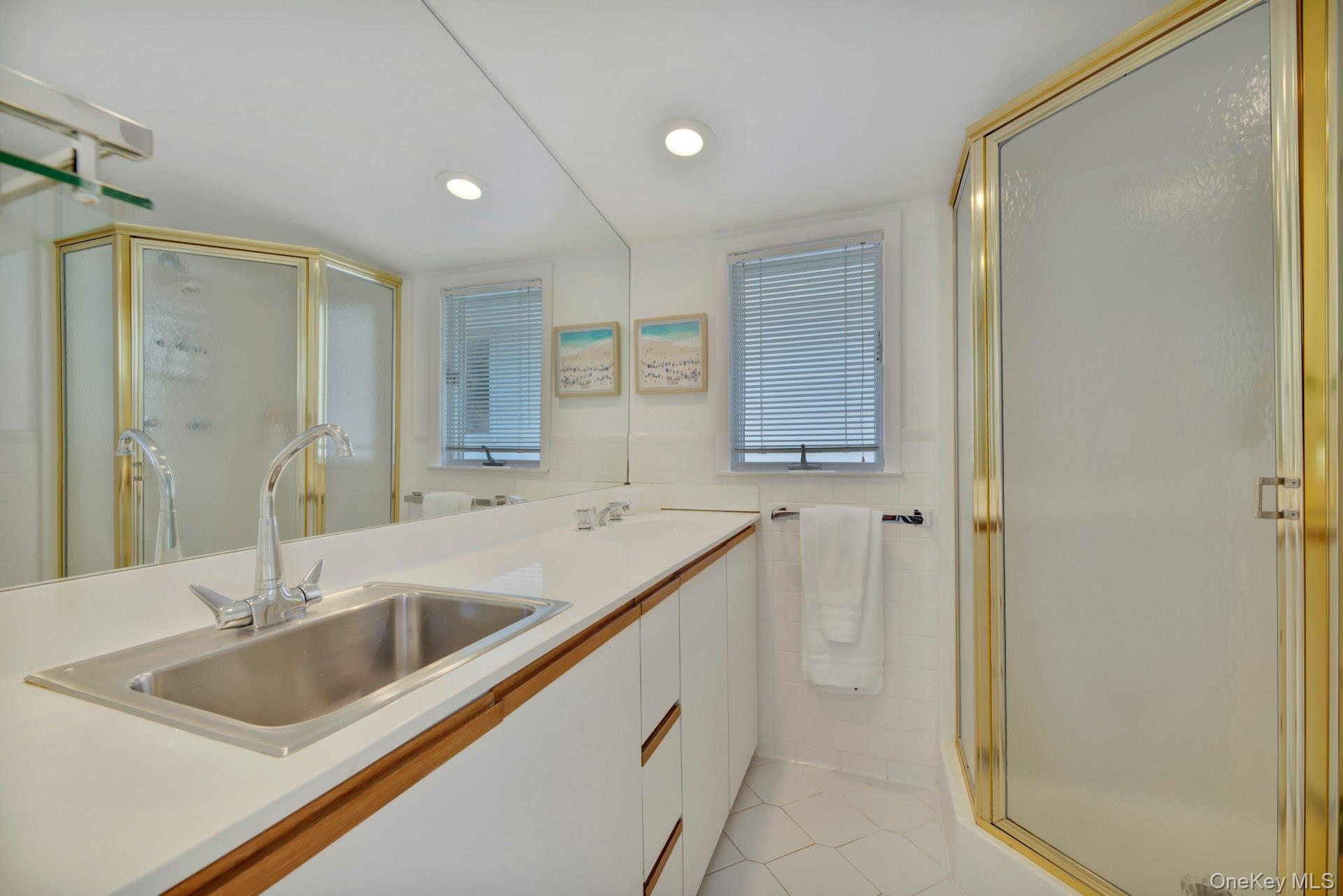 94 South Country Road Remsenburg, NY 11960 - Photo 25 of 40 2nd floor private en-suite with shower and secondary sink