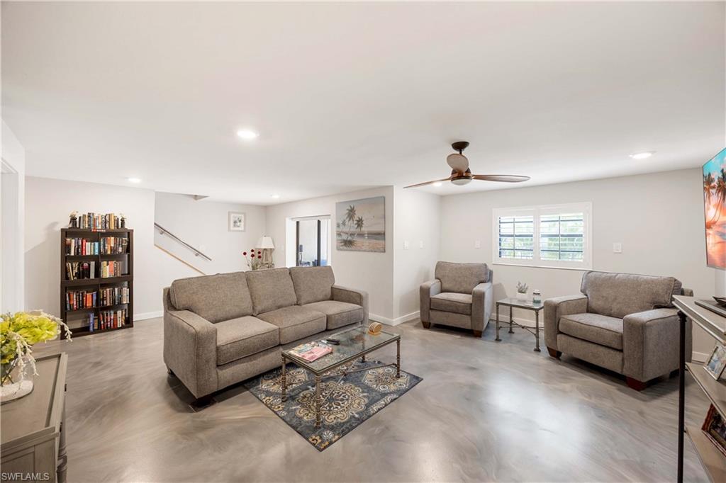 9395 Pennsylvania Avenue, Unit 3 Bonita Springs, FL 34135 - Photo 30 of 42 Living room featuring ceiling fan