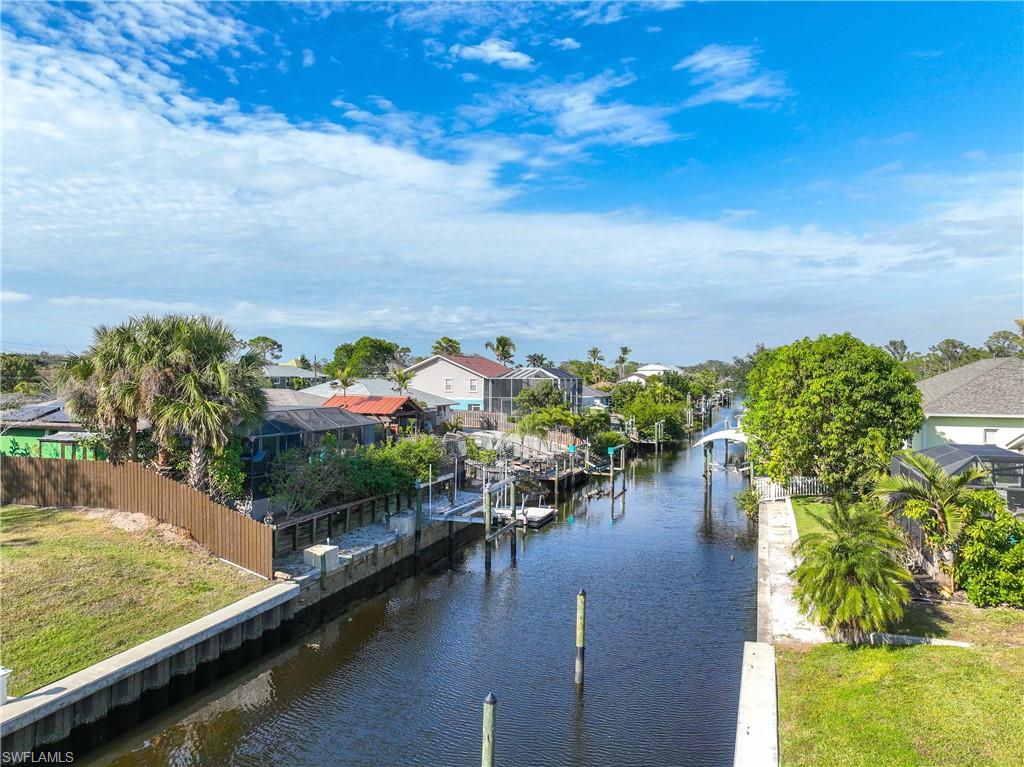 9395 Pennsylvania Avenue, Unit 3 Bonita Springs, FL 34135 - Photo 41 of 42 Water view featuring a dock