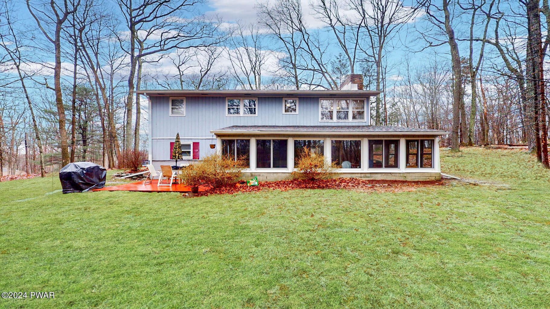 134 Sunnylands Road Milford, PA 18337 - Photo 2 of 59 a front view of a house with a garden