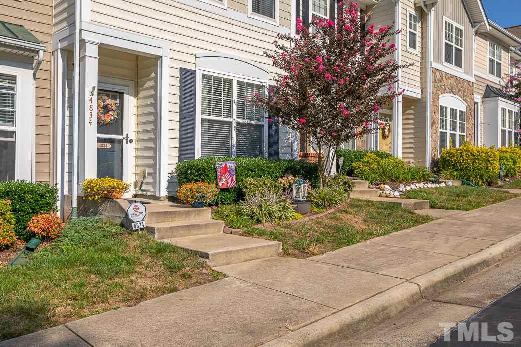 4834 Sir Duncan Way Raleigh, NC 27612 - Photo 2 of 27 Beautifully landscaped and has two assigned parking spaces.
