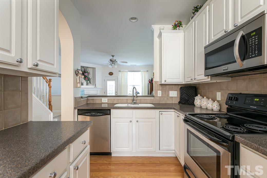 4834 Sir Duncan Way Raleigh, NC 27612 - Photo 6 of 27 Stainless/black appliances are 3 years old.