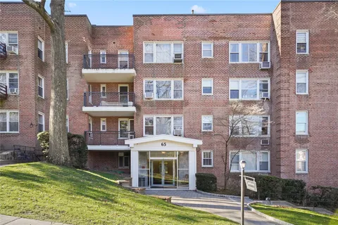 a view of a building with a garden