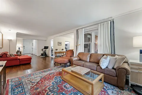 a living room with furniture and a couch
