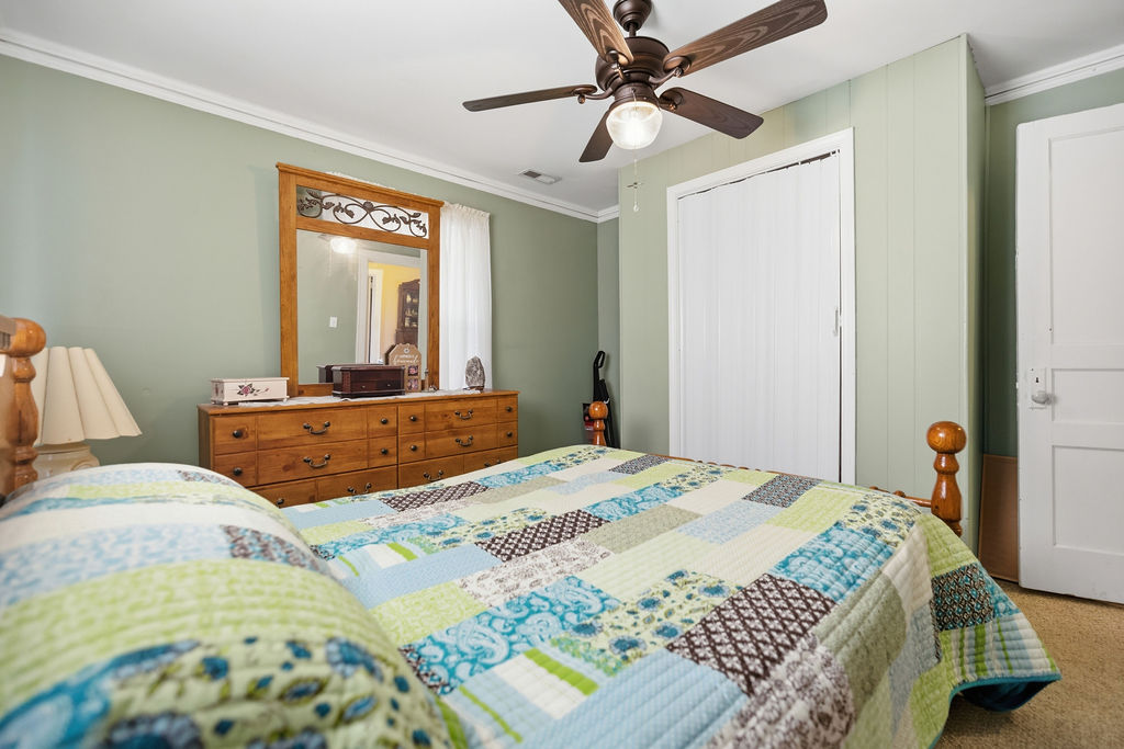 3212 Dixon Road Anderson, SC 29625 - Photo 9 of 23 This cozy bedroom offers a tranquil retreat with ample space and essential comforts.