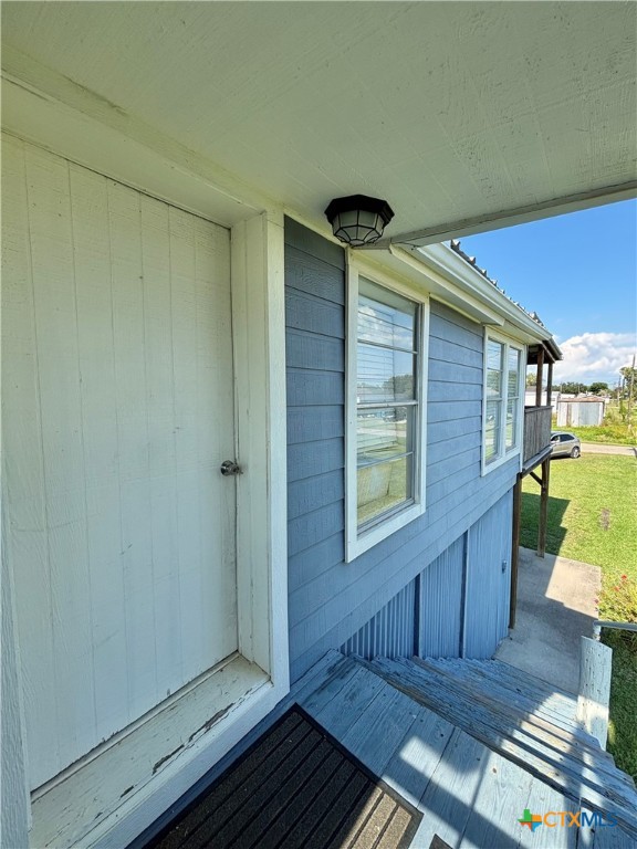 307 North 12th Port Port O'Connor, TX 77982 - Photo 11 of 45 a view of a room with wooden floor and furniture